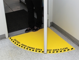 Accuform Signs® 34" X 34" Black/Yellow Adhesive Vinyl Slip-Gard™ Floor Sign "CAUTION DOOR SWING AREA KEEP CLEAR"